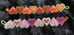 Beaded Heart Bracelet approx 7” (Choice of Pink or Red)